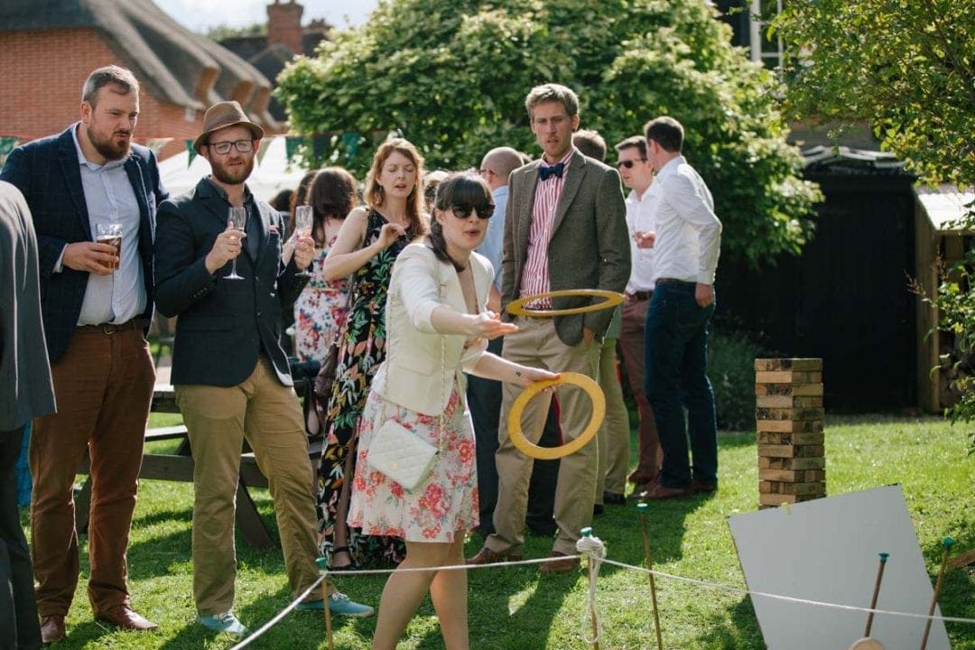 Guests playing lawn games at an Oxford wedding