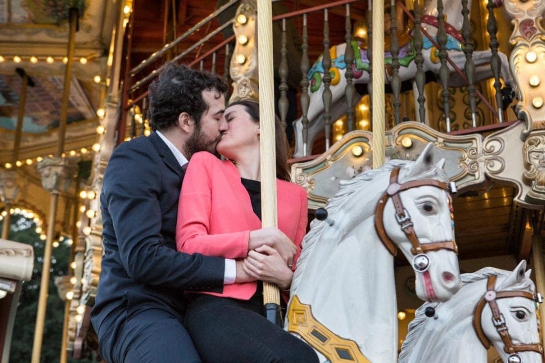 Engagement photoshoot on a merry go round in Paris