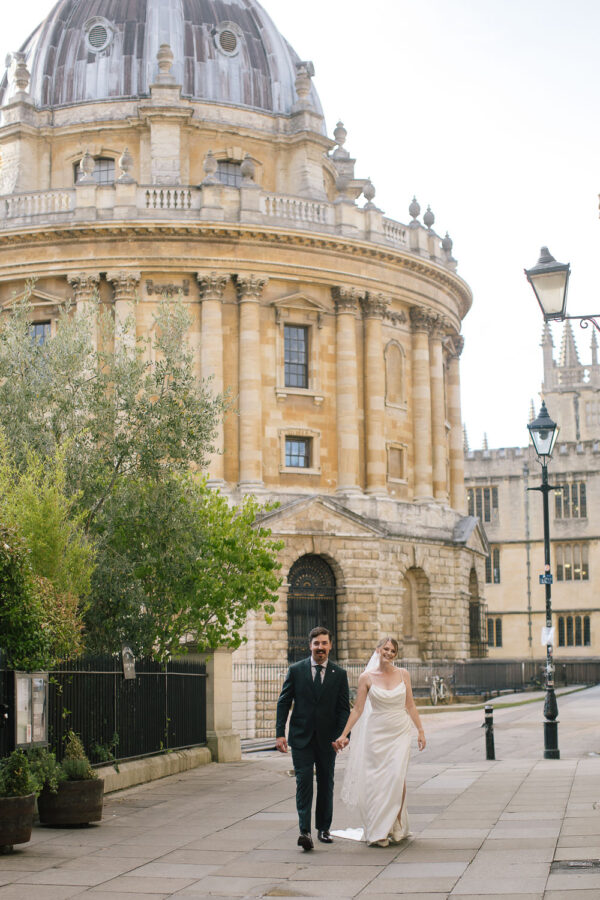 Modern elopement shot outside the Radcliffe Camera, blending history and romance