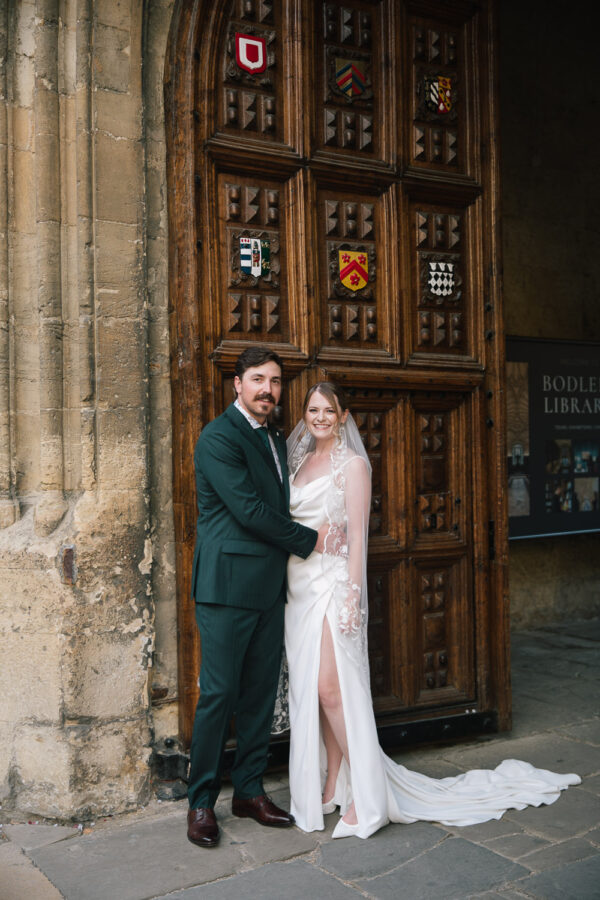 Romantic wedding portrait in front of the Bodleian Library, one of Oxford’s most iconic buildings